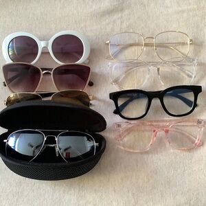 4 blue light glasses and 4 pair of sunglasses